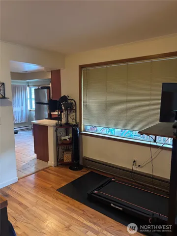 a kitchen with a stove and a refrigerator