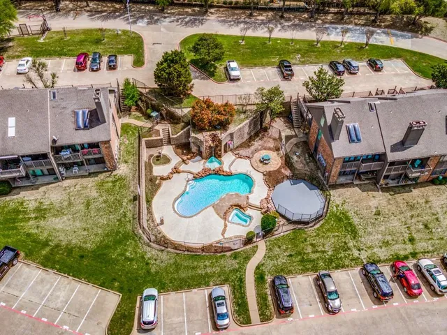 a view of swimming pool with outdoor seating
