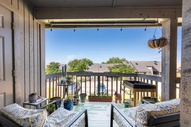 a balcony view with a couch