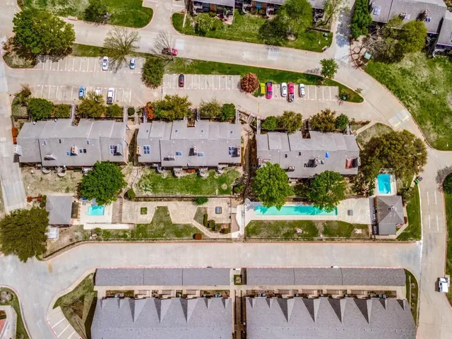 an aerial view of a building with outdoor space