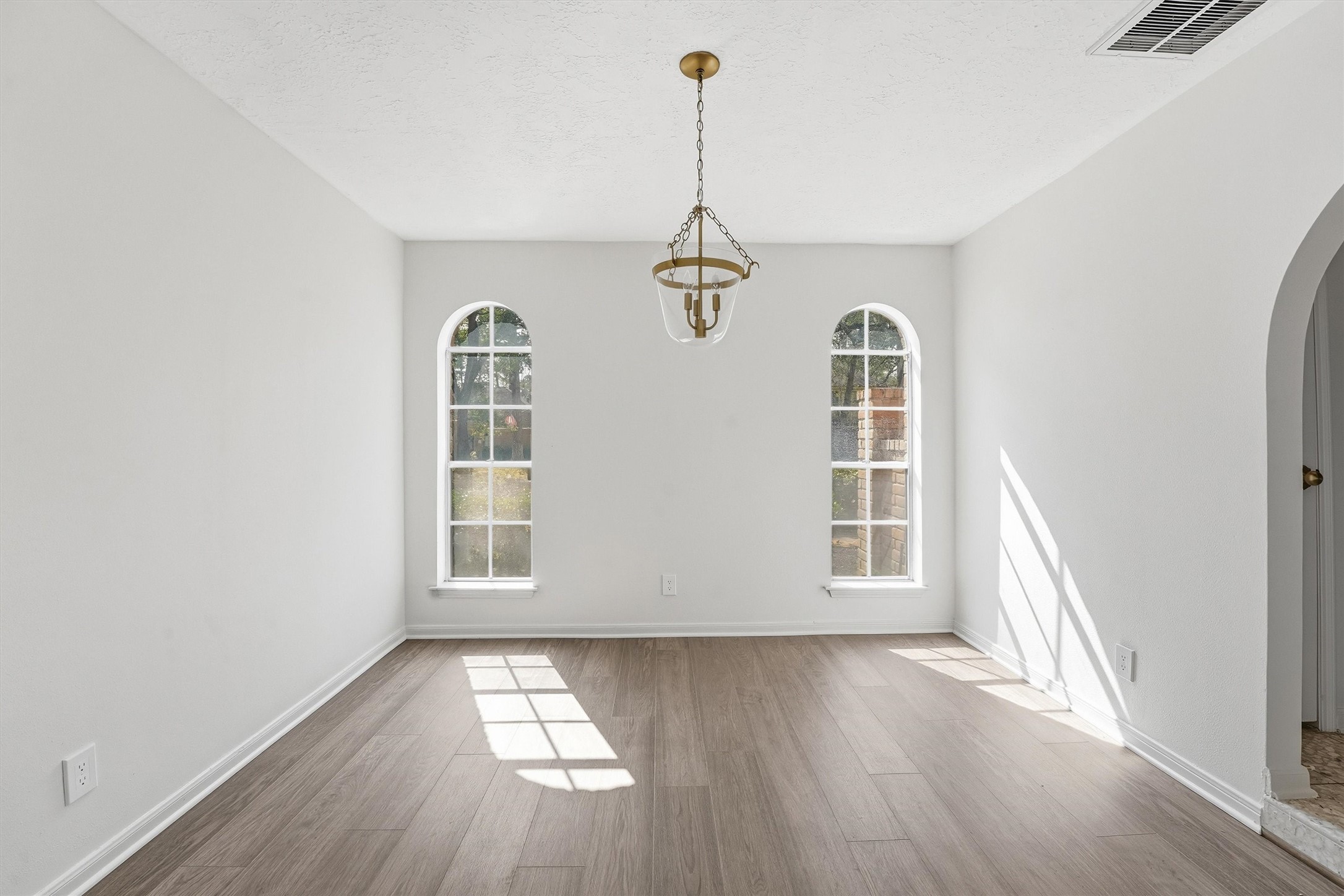2203 Rolling Meadows Drive Houston, TX 77339 - Photo 15 of 27 a view of empty room with windows