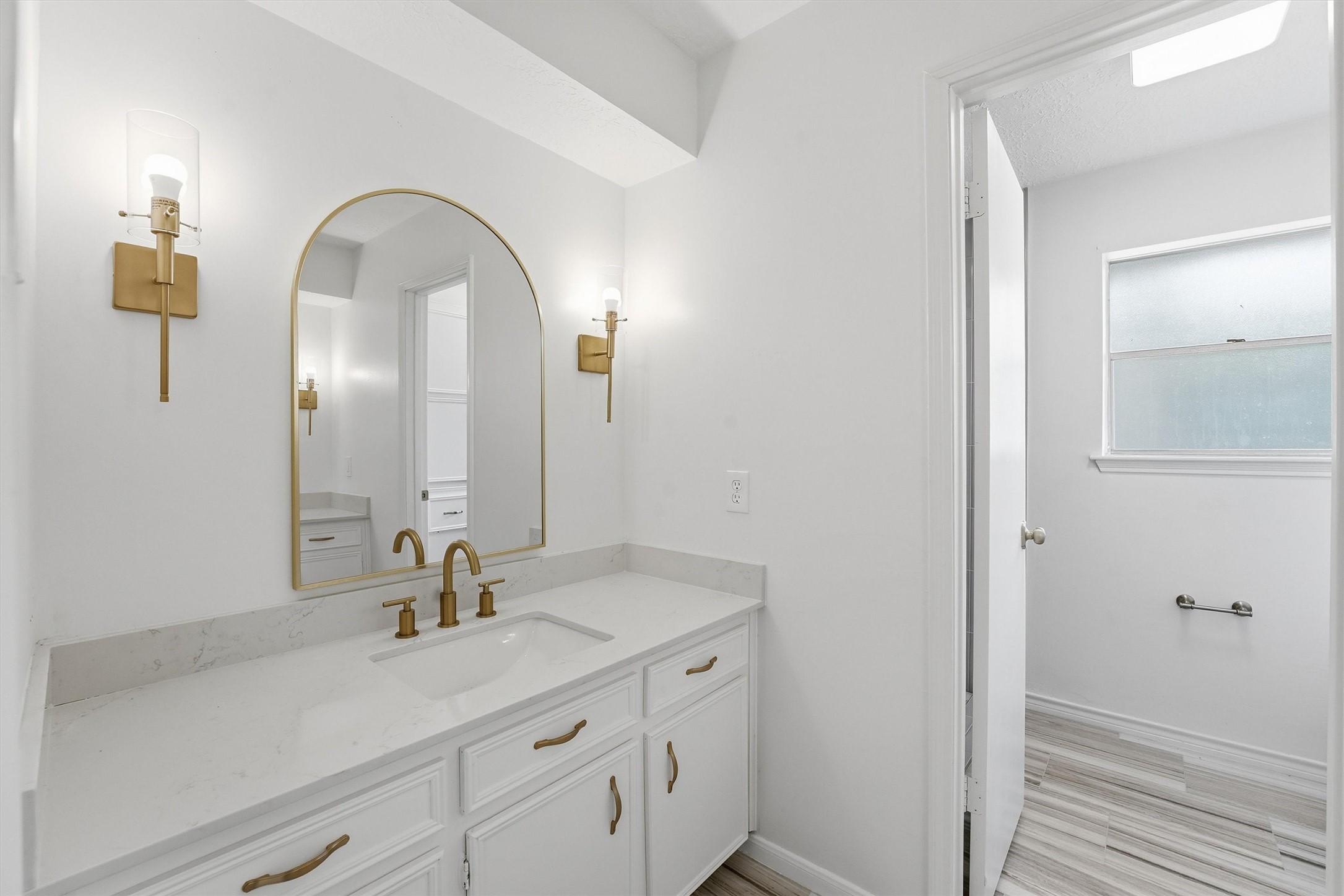 2203 Rolling Meadows Drive Houston, TX 77339 - Photo 23 of 27 a bathroom with a double vanity sink and a mirror