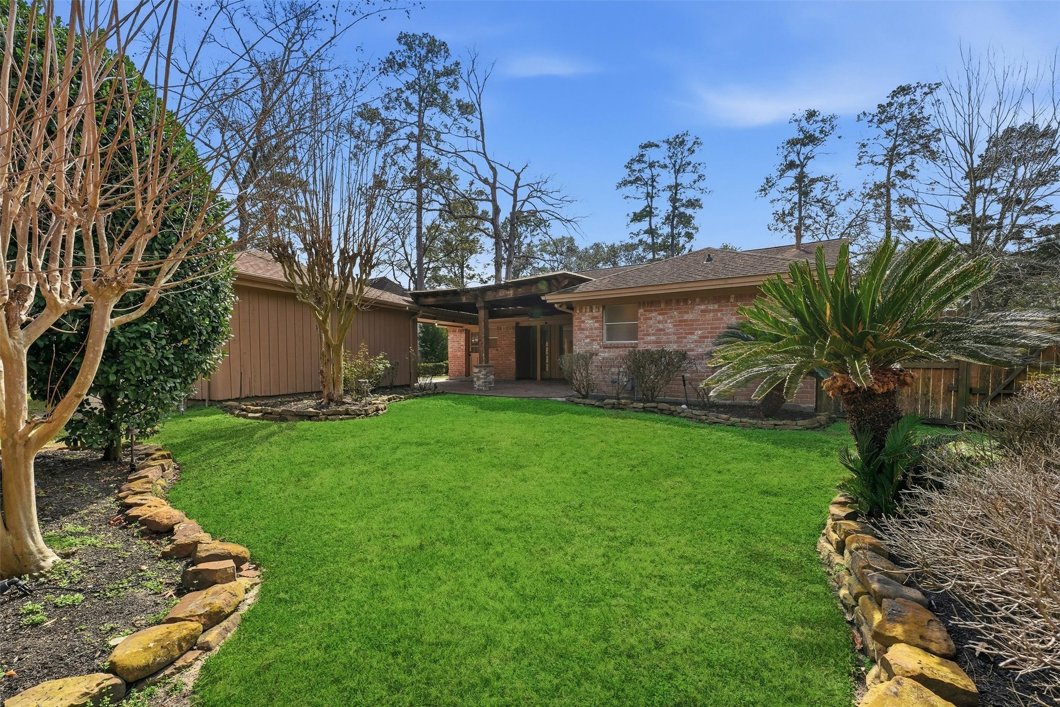 2203 Rolling Meadows Drive Houston, TX 77339 - Photo 27 of 27 a view of a house with a yard and tree s