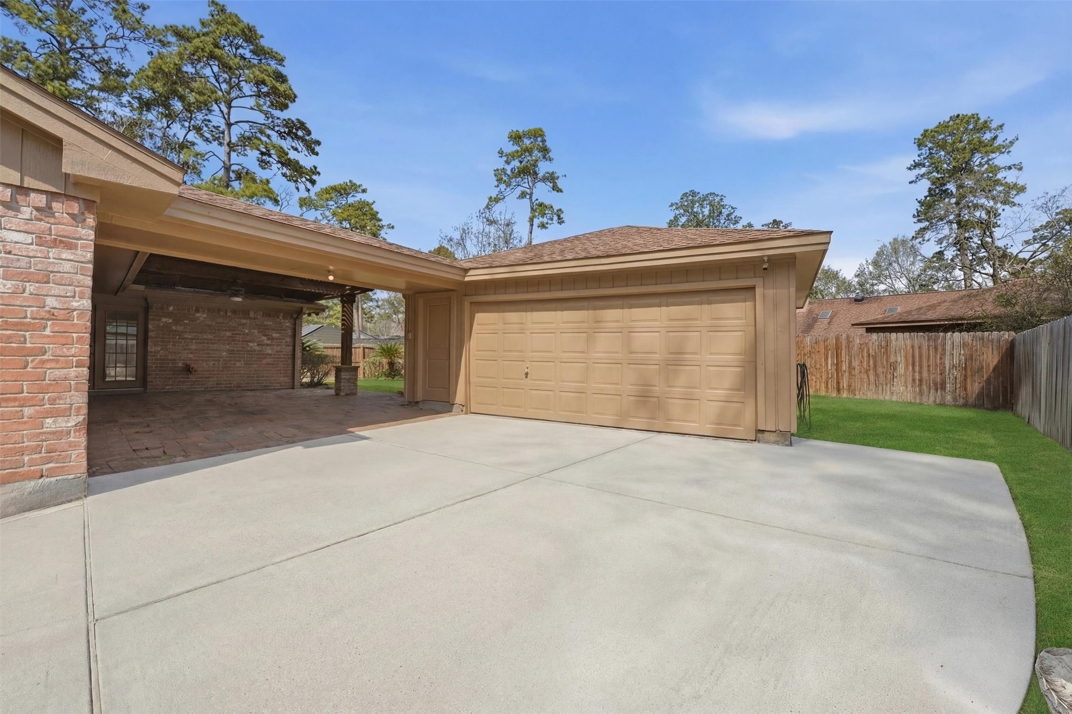 2203 Rolling Meadows Drive Houston, TX 77339 - Photo 8 of 27 a view of outdoor space garage and yard
