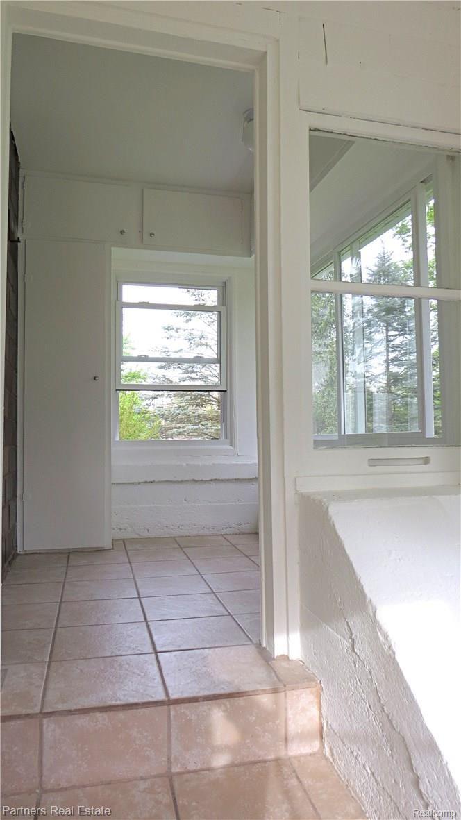 4524 Pinckney Road Howell, MI 48843 - Photo 15 of 58 10d.Additional Entrance-room off Back southside of home