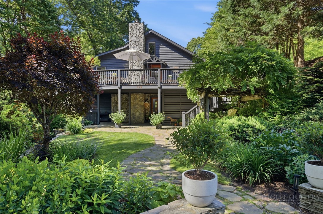 165 All Hallows Road Boone, NC 28607 - Photo 28 of 50 a front view of a house with a garden