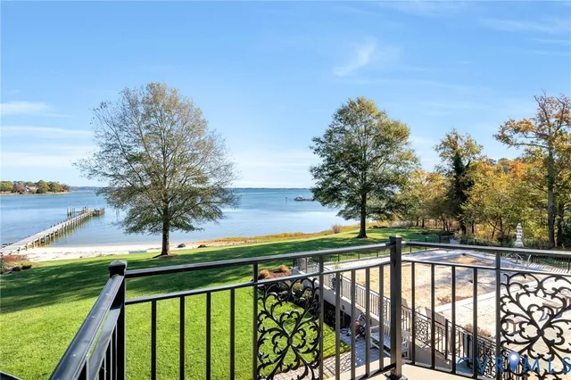 a view of swimming pool from a balcony