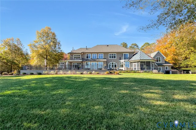 a view of a park with large trees