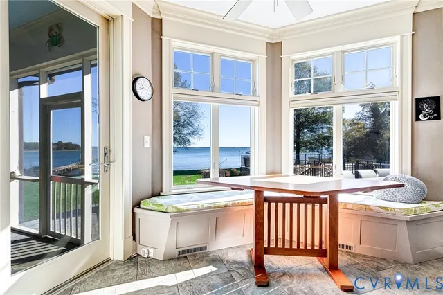a kitchen with granite countertop a sink stove and cabinets