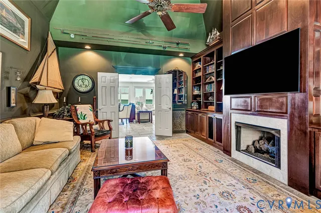 a view of walk in closet with clothes