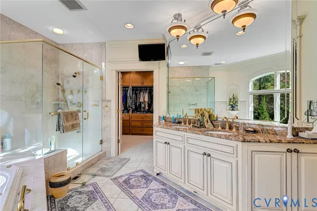 a living room with furniture and a ceiling fan