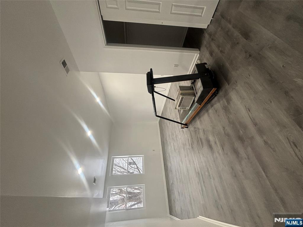 48 1/2 3rd Street Newark, NJ 07107 - Photo 9 of 20 a view of a room with gym equipment