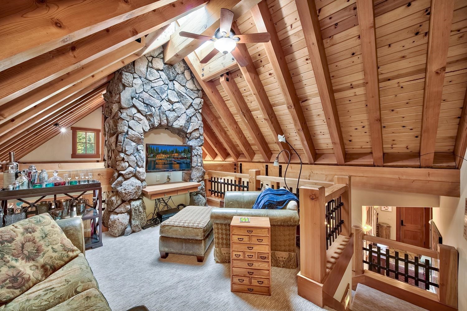 120 Bob Watson Truckee, CA 96161 - Photo 19 of 21 a living room with furniture and a fireplace