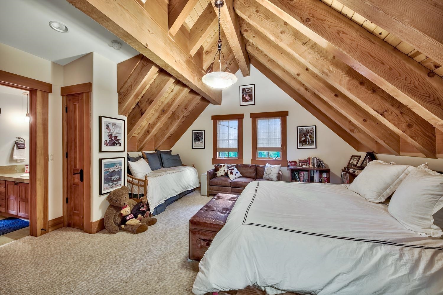 120 Bob Watson Truckee, CA 96161 - Photo 20 of 21 a bed room with a bed and a chandelier