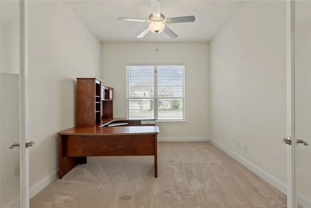 a room with a bed and a window