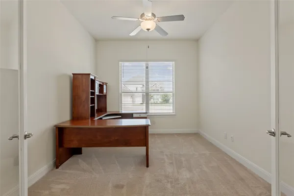 a room with a bed and a window