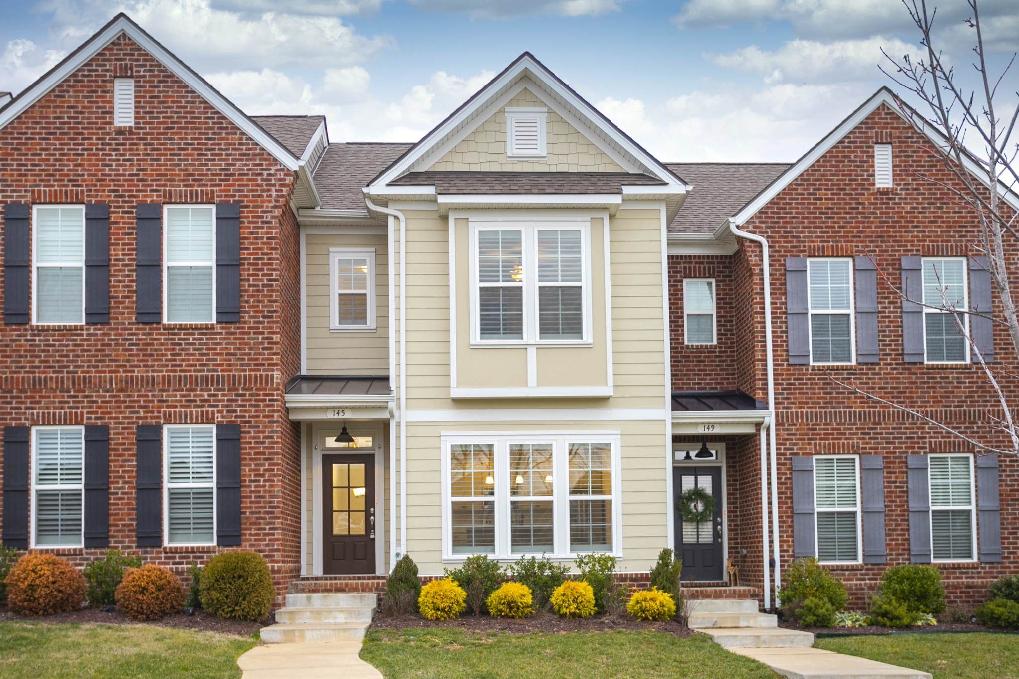 145 Mary Ann Circle Spring Hill, TN 37174 - Photo 1 of 36 a front view of a house with a yard