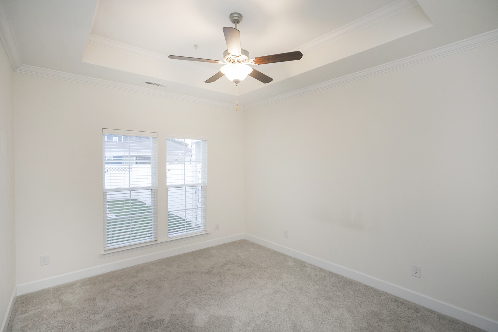 145 Mary Ann Circle Spring Hill, TN 37174 - Photo 20 of 36 an empty room with windows and fan