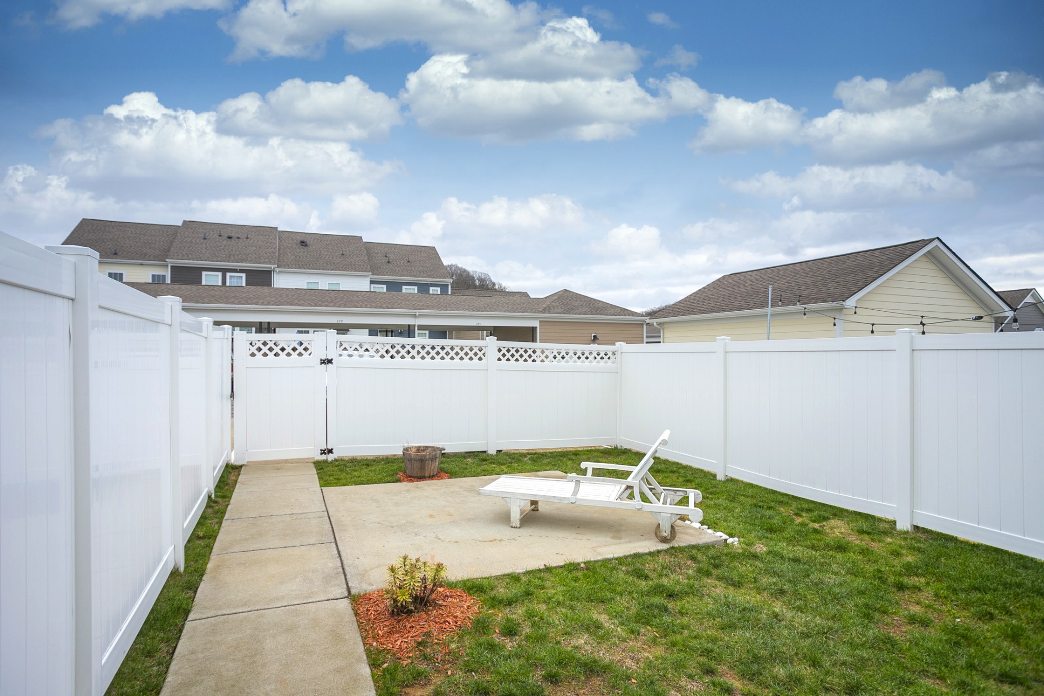 145 Mary Ann Circle Spring Hill, TN 37174 - Photo 26 of 36 a view of a terrace with a garden