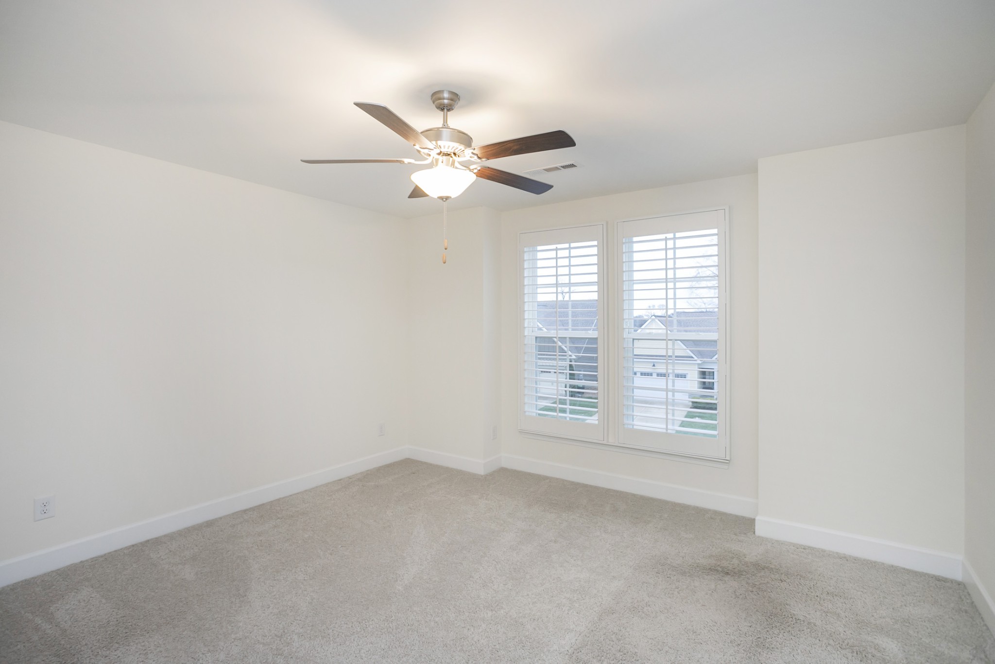 145 Mary Ann Circle Spring Hill, TN 37174 - Photo 32 of 36 an empty room with windows and fan