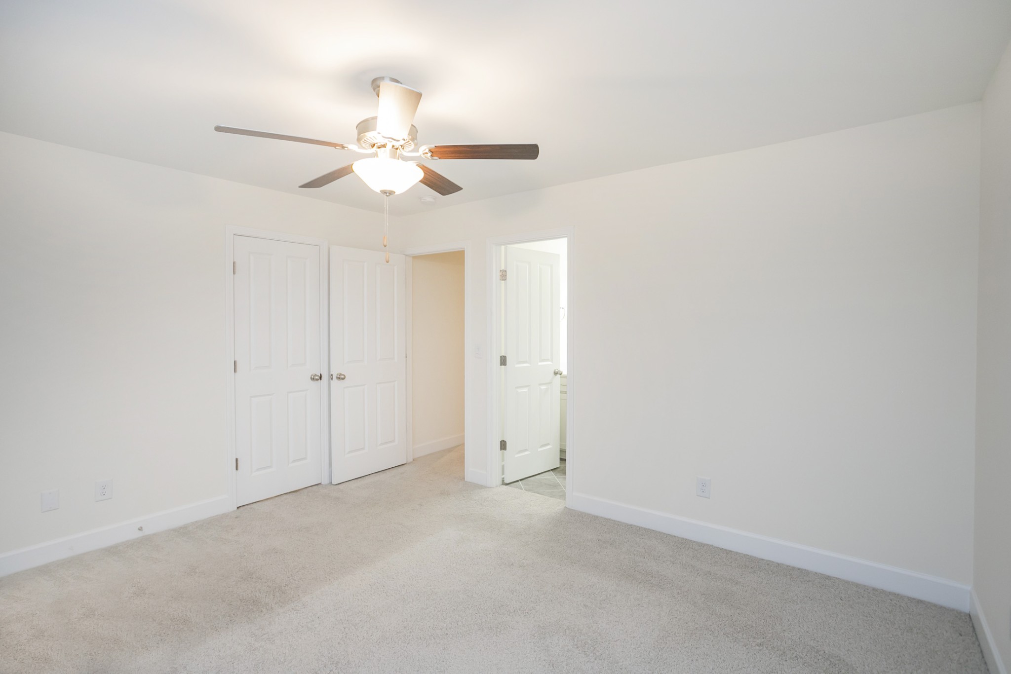 145 Mary Ann Circle Spring Hill, TN 37174 - Photo 34 of 36 an empty room with closet and a ceiling fan
