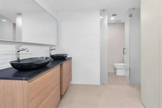 a view of a livingroom from a hallway