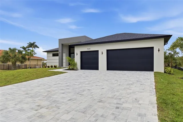 a house with yard in front of it