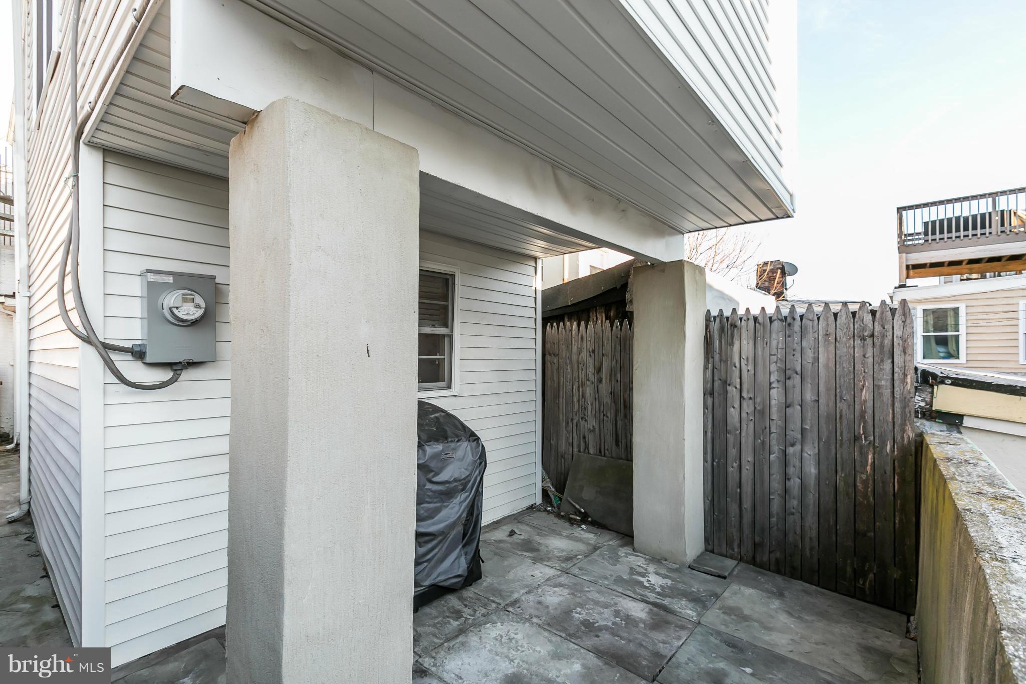 718 South Port Street Baltimore, MD 21224 - Photo 25 of 25 Rear stone patio