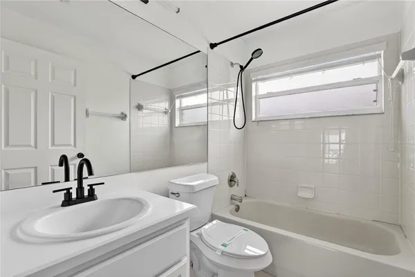 an empty room with fan