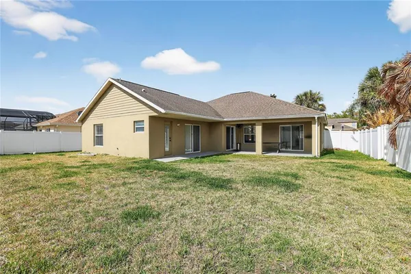 aerial view of a house with garden