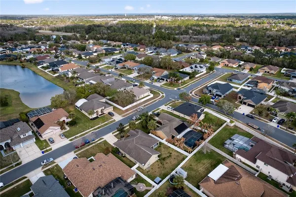 an aerial view of residential house with parking space