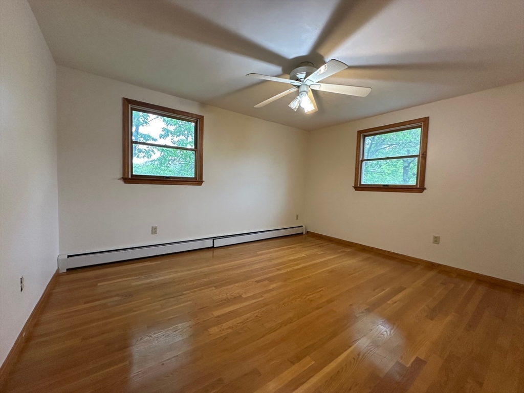 15 Curlew Street Boston, MA 02132 - Photo 15 of 30 a view of an empty room with a window