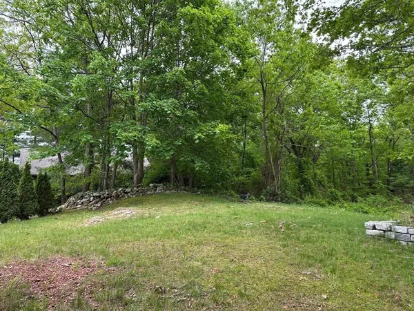 a view of outdoor space with deck and yard
