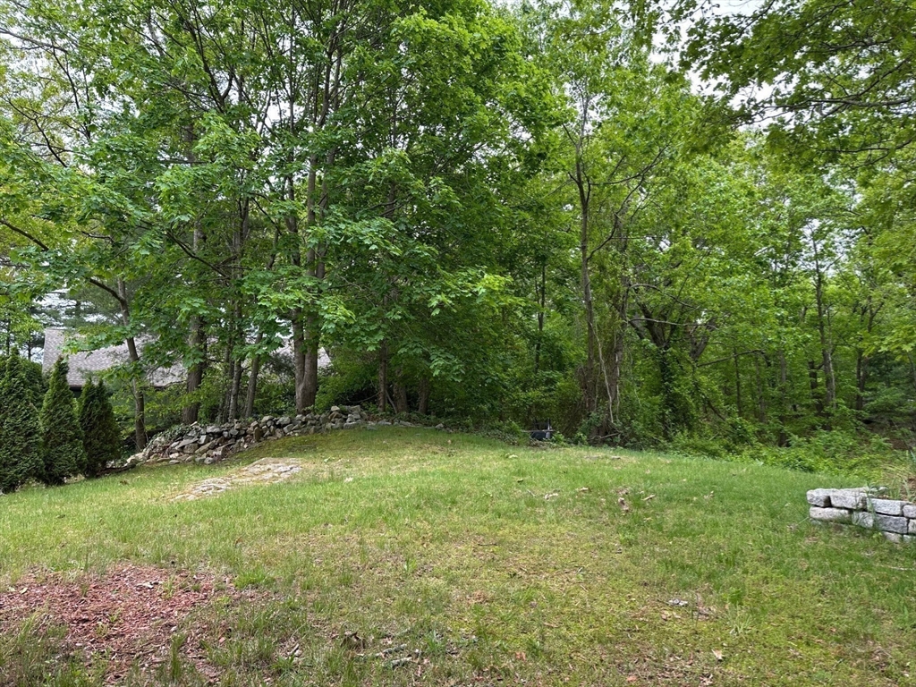 15 Curlew Street Boston, MA 02132 - Photo 27 of 30 a view of outdoor space with deck and yard