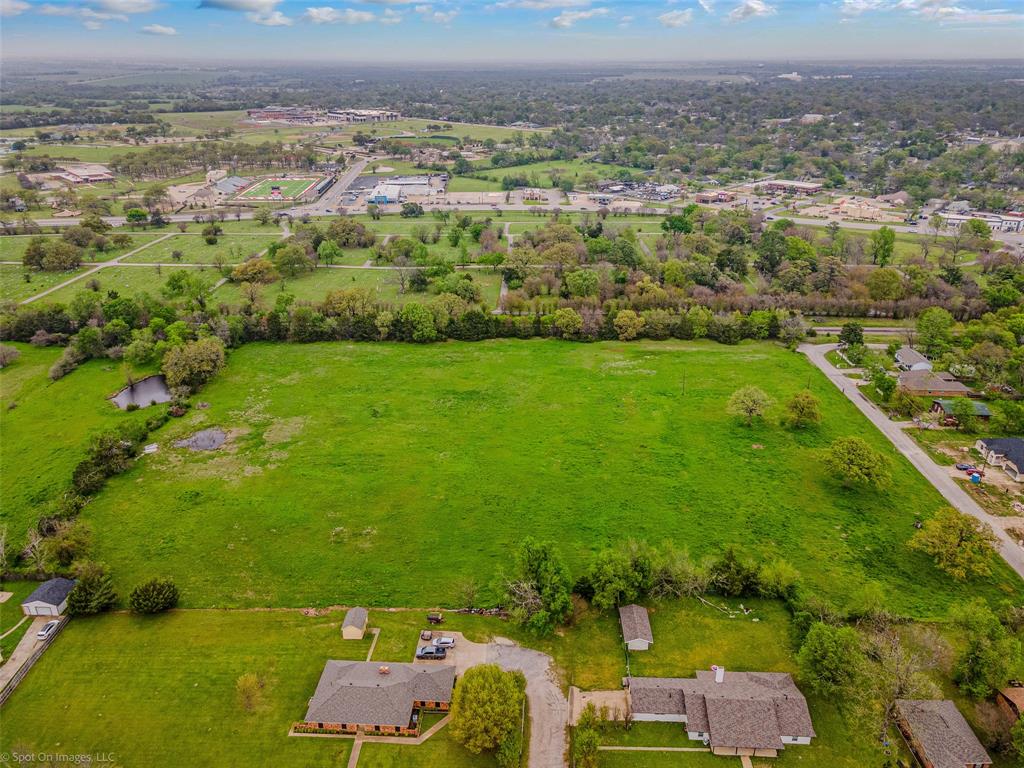 0 Eason Street Terrell, TX 75160 - Photo 5 of 17 an aerial view of residential houses with outdoor space and trees