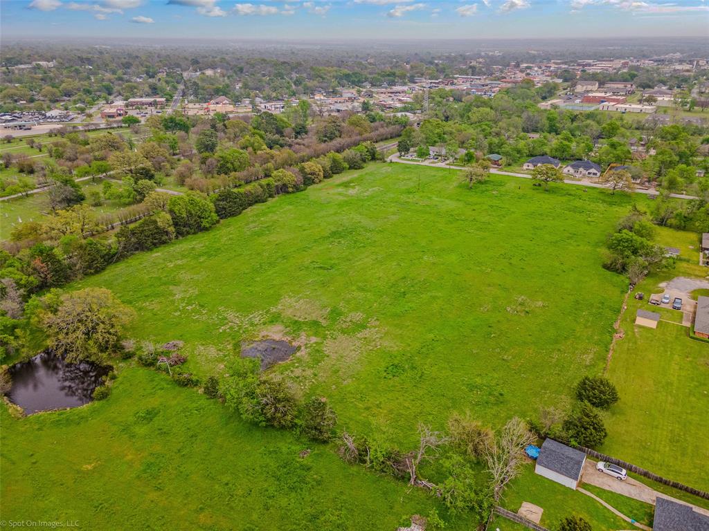 0 Eason Street Terrell, TX 75160 - Photo 9 of 17 a view of a city with lush green forest