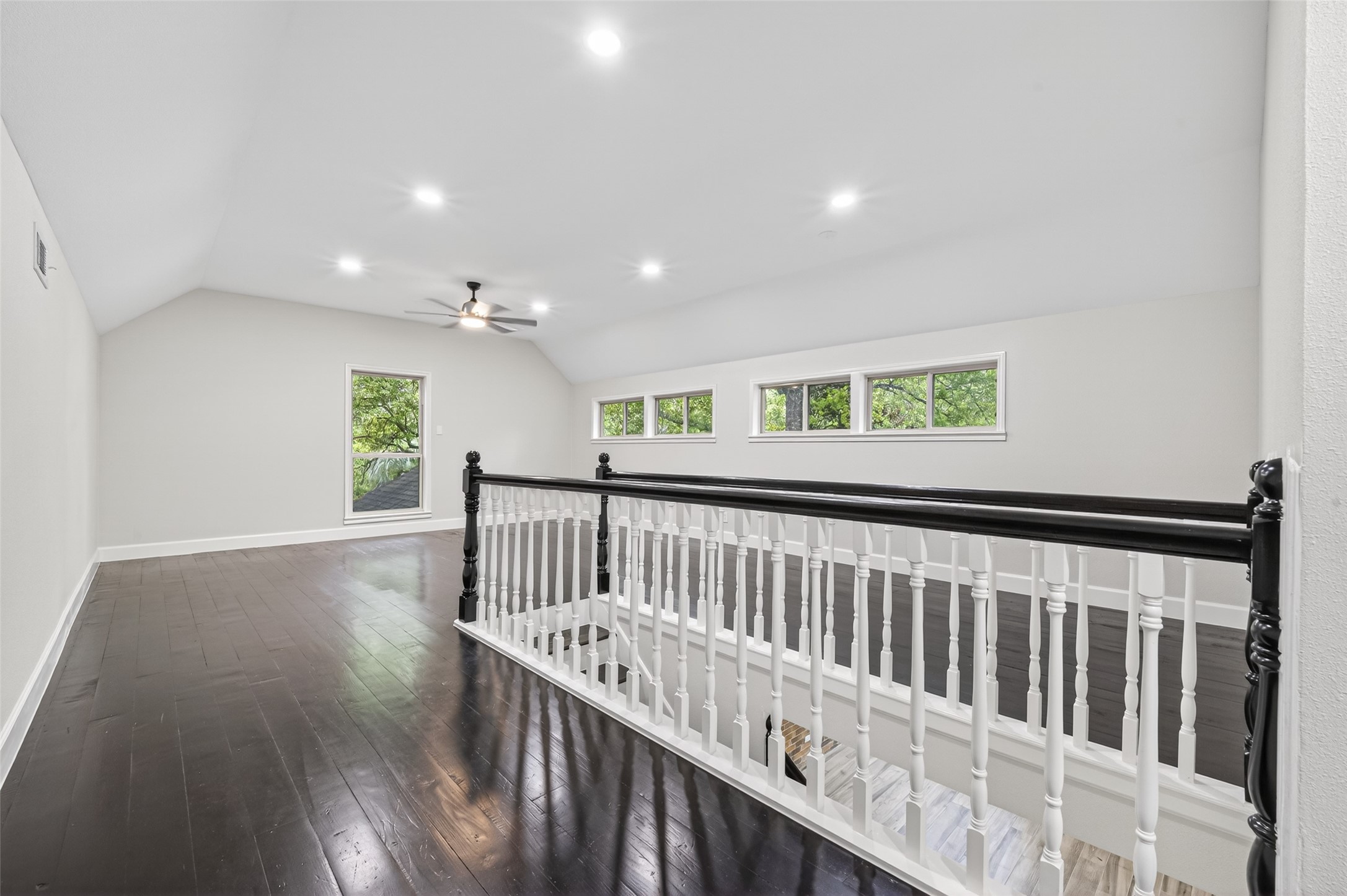 23607 Cardinal Drive Hockley, TX 77447 - Photo 29 of 50 Upstairs, the expansive gameroom shines with polished hardwoods that reflect the glow of recessed lighting and daylight from numerous windows.