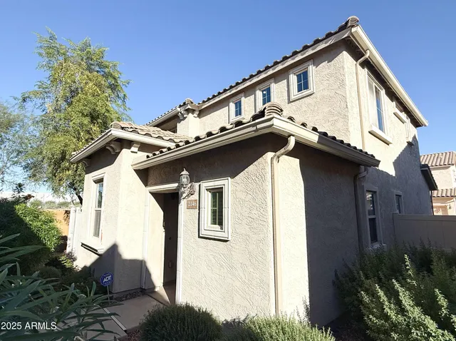 a view of a house with a garage