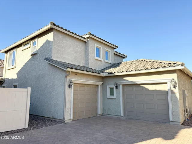 a view of a house with garage