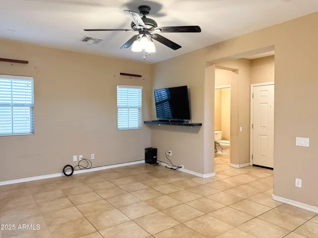 a view of a livingroom with a workspace