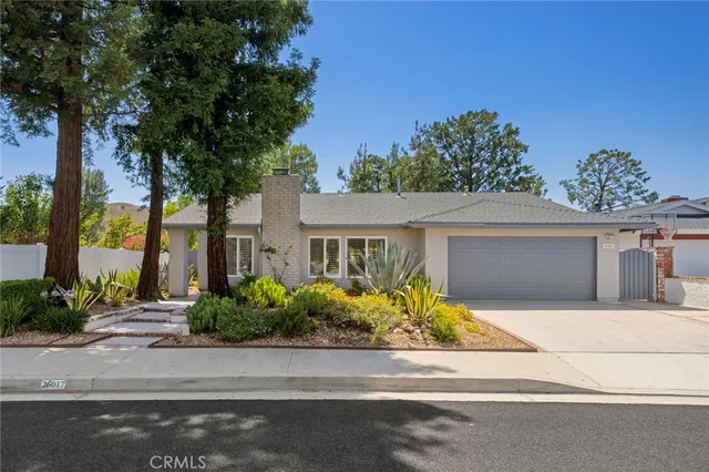 front view of a house with a street