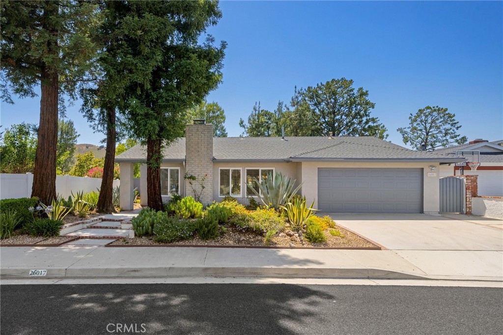 26017 Redbluff Drive Calabasas, CA 91302 - Photo 1 of 29 front view of a house with a street