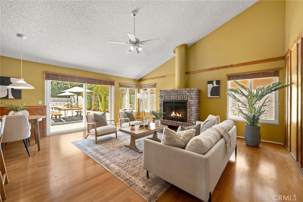 26017 Redbluff Drive Calabasas, CA 91302 - Photo 12 of 29 a living room with furniture and a fireplace