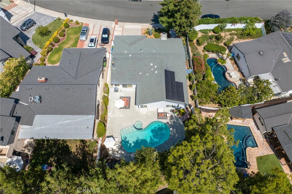 26017 Redbluff Drive Calabasas, CA 91302 - Photo 27 of 29 an aerial view of multiple houses with outdoor space
