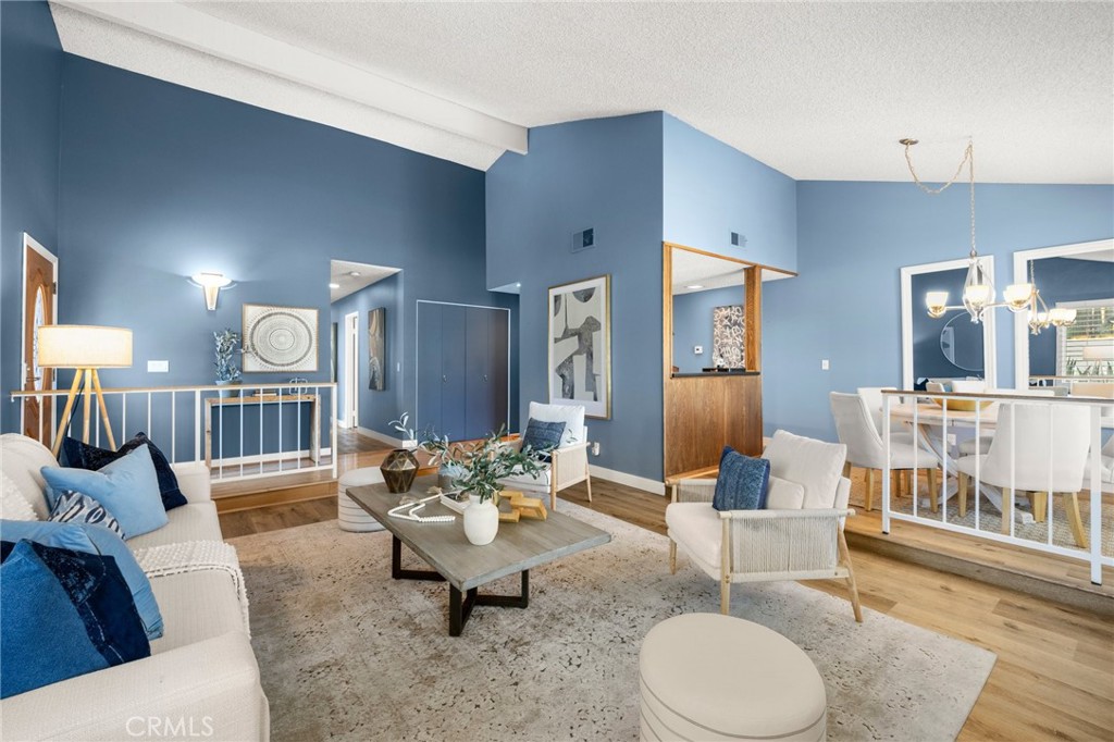 26017 Redbluff Drive Calabasas, CA 91302 - Photo 5 of 29 a living room with furniture and wooden floor