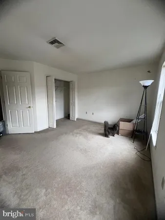 a view of a livingroom with a staircase