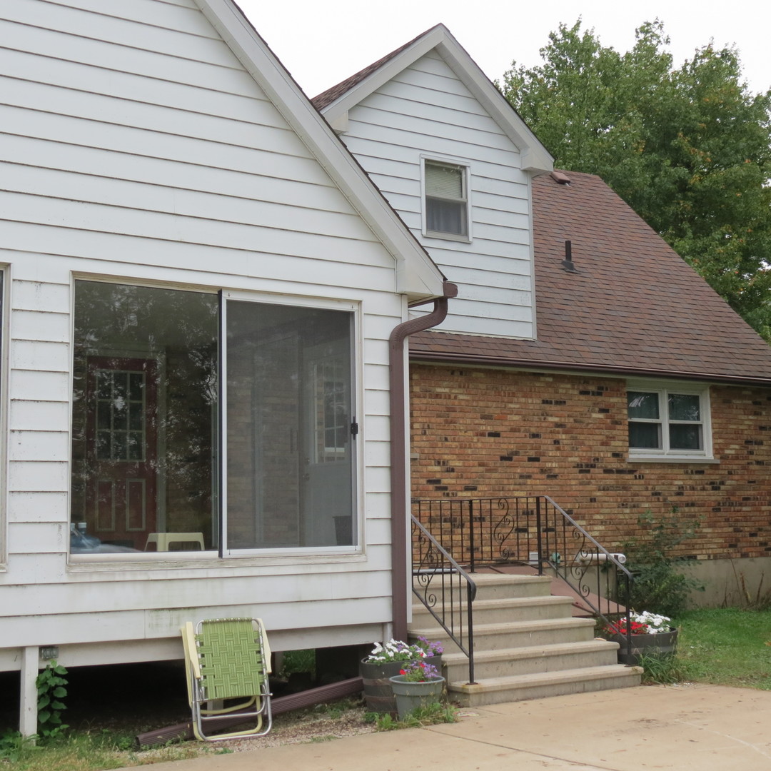 27160 South Center Road Monee, IL 60449 - Photo 7 of 7 a view of a house with a window and stairs