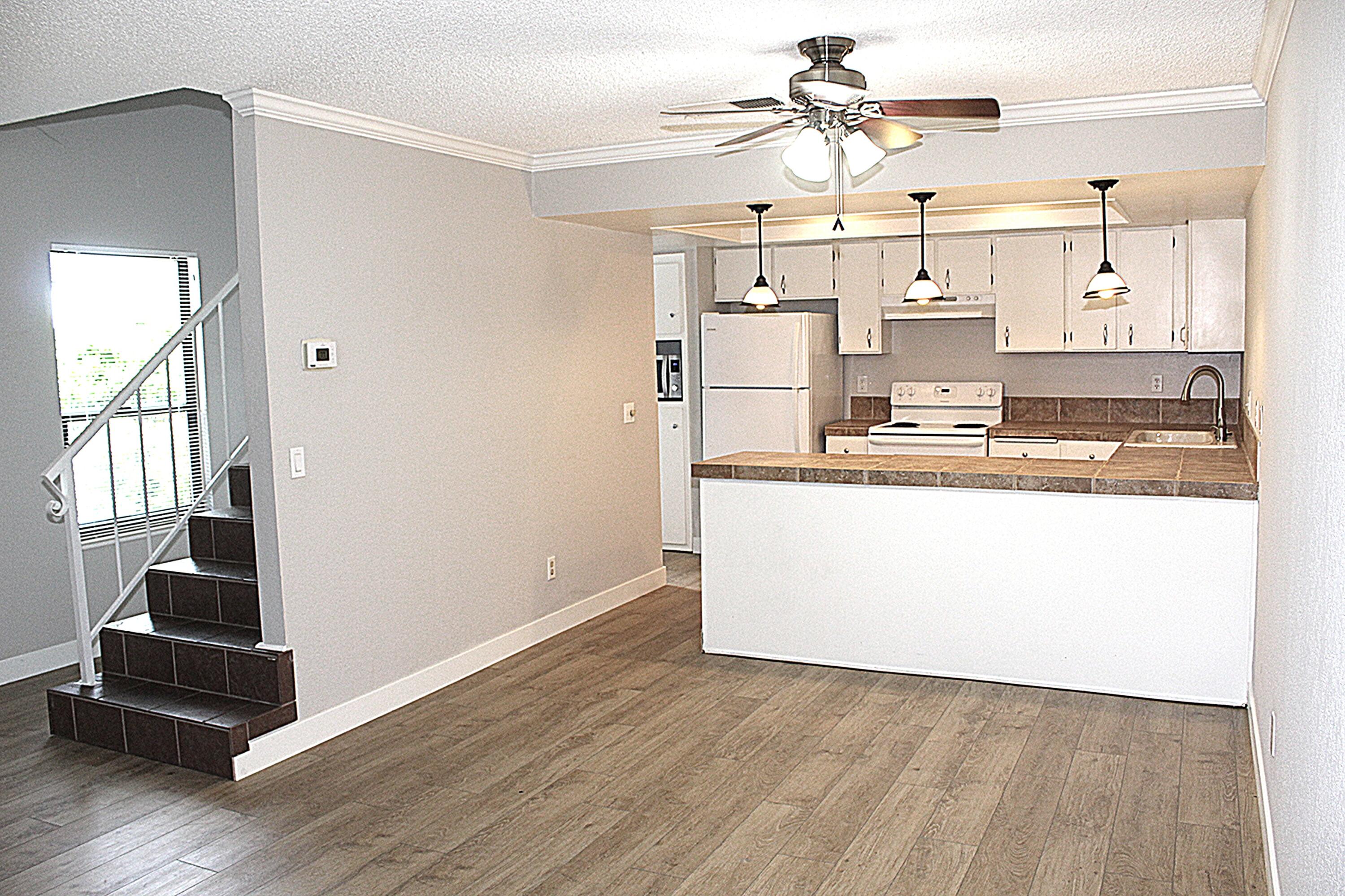 1975 Bechelli Lane Redding, CA 96002 - Photo 4 of 25 Kitchen and flor stairs