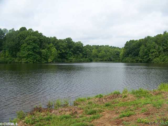 0 Reservoir Road Victoria, VA 23974 - Photo 8 of 8 a view of a lake with a city