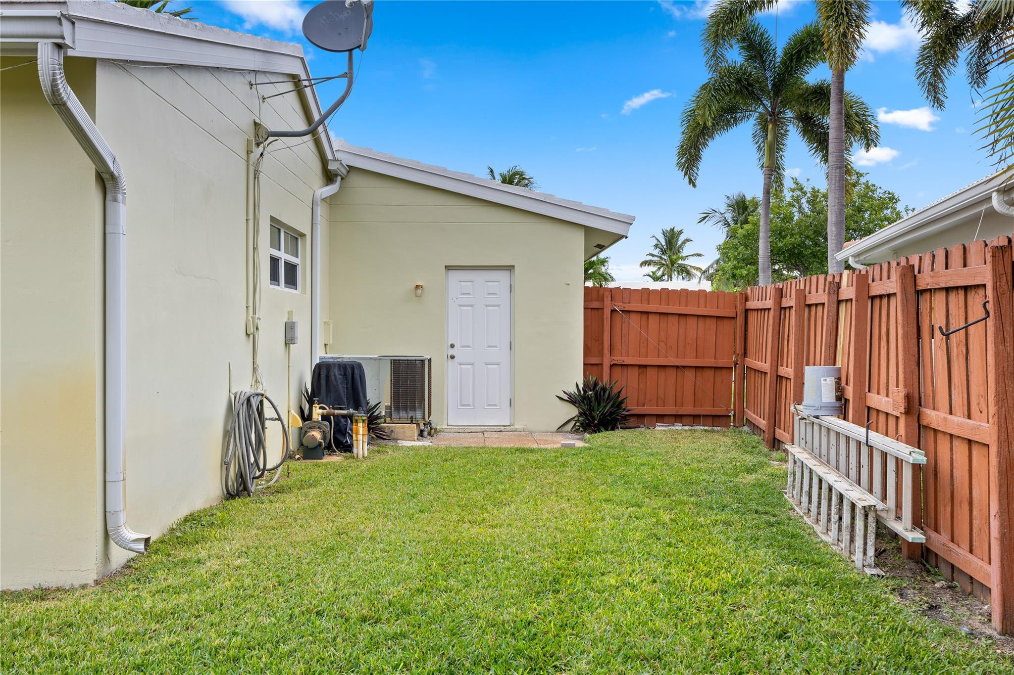 6543 Northeast 21st Road Fort Lauderdale, FL 33308 - Photo 11 of 38 a house view with a backyard space